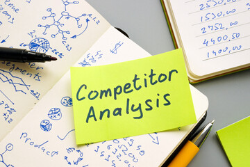 Competitor analysis written on a sticky note